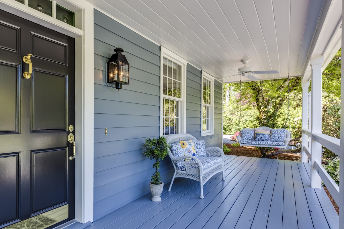 Inviting vacation rental entryway with seating — the ideal spot to place a check-in QR code