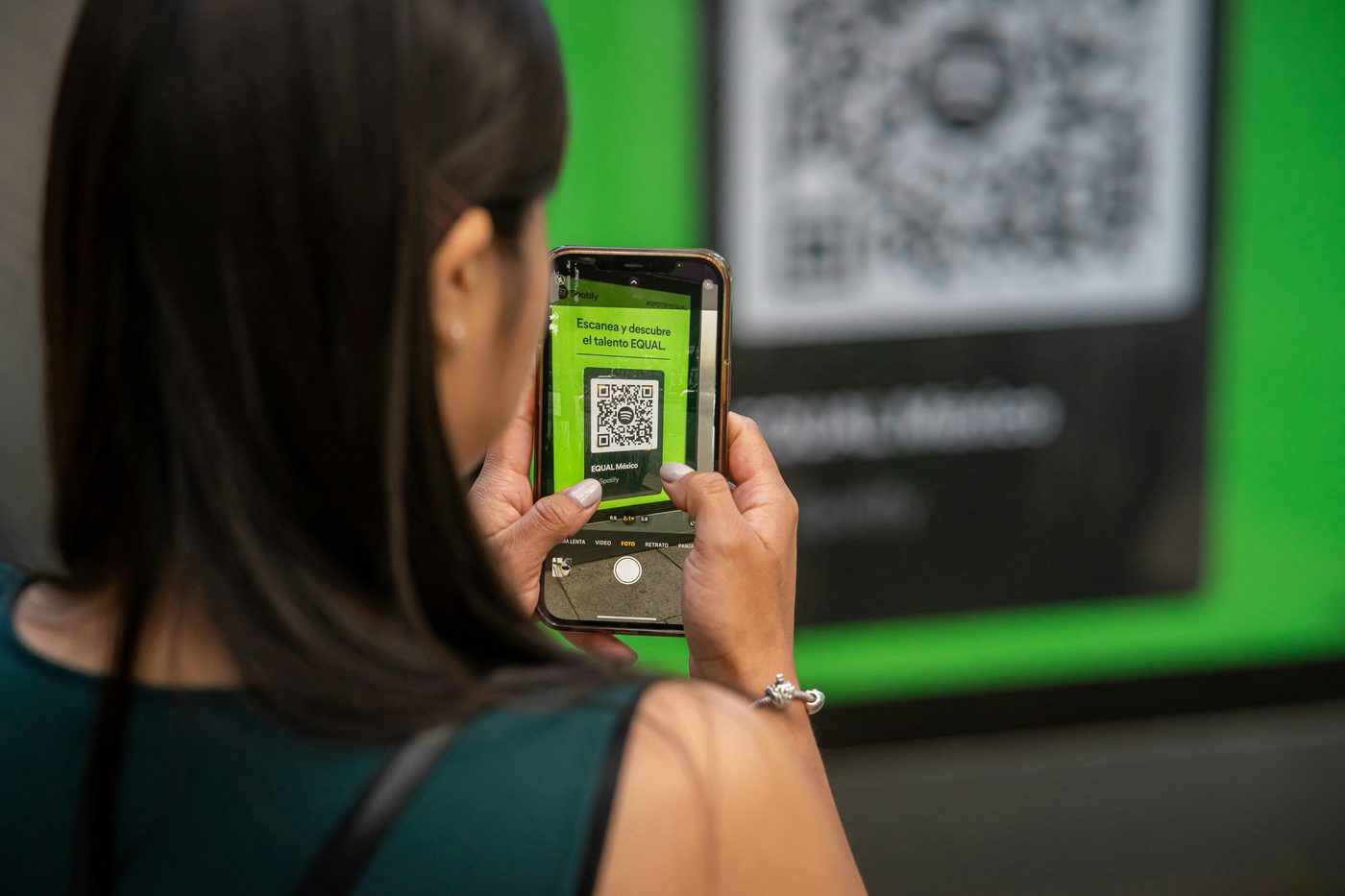 Person scanning a FIFA World Cup 2026 digital ticket QR code on a smartphone
